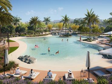 Aerial view of swimming pool at Mudon Al Ranim townhouses in Dubailand, developed by Dubai Properties